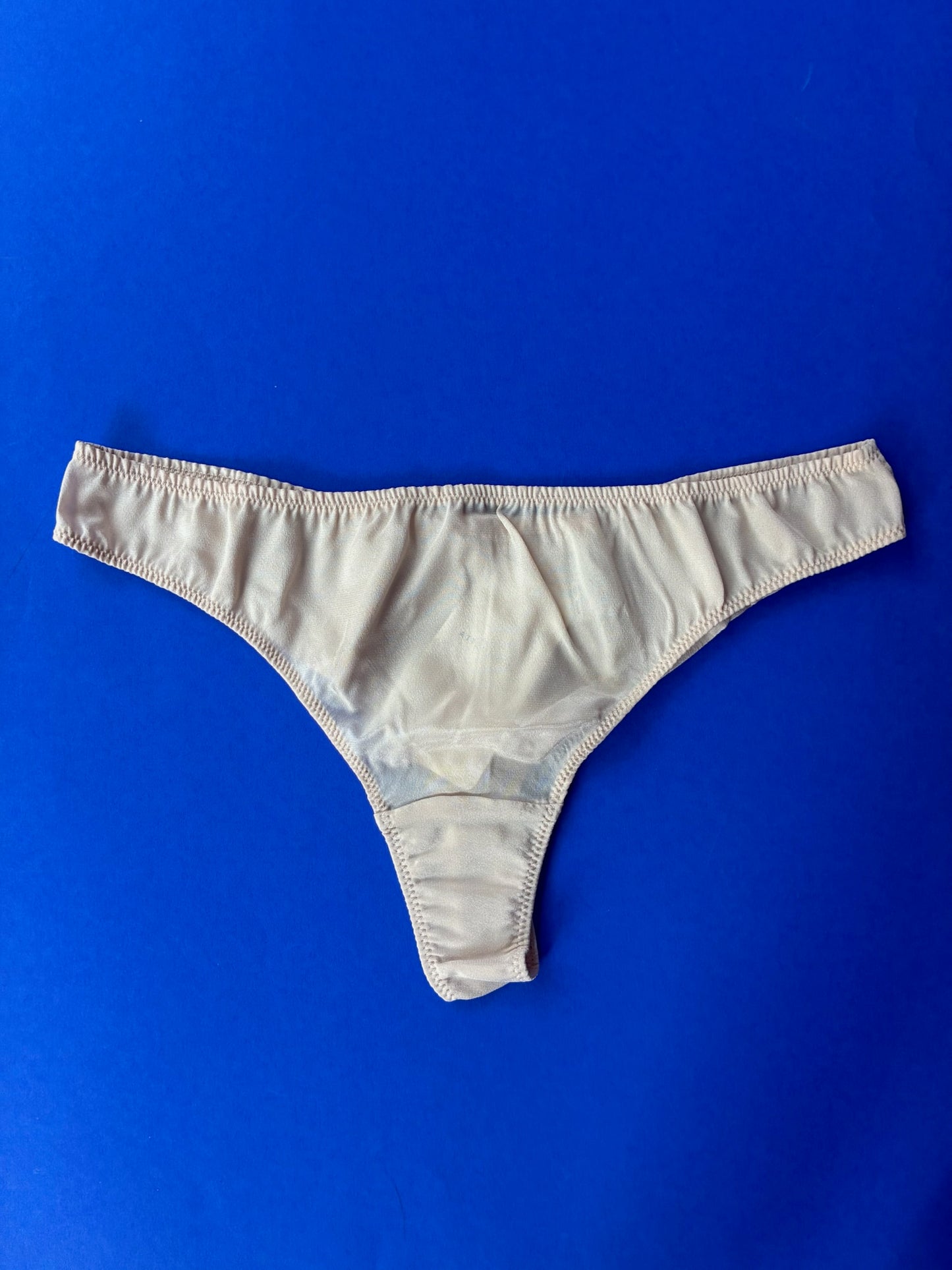 L'ANGÉLIQUE: Tanga Silk Thong - Beige